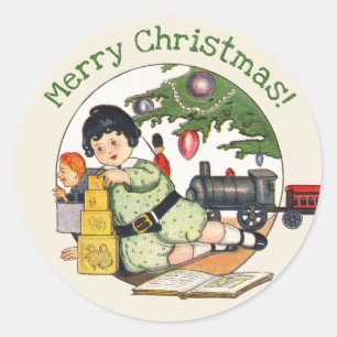 Sticker Rond Noël vintage, Joyeux garçon jouant avec des jouets