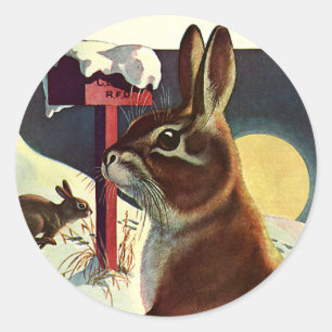 Sticker Rond Noël vintage, lapins dans une prairie enneigée en 