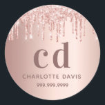 Sticker Rond Nom des gouttes d'or rose<br><div class="desc">Un arrière - plan rose en or. Décoré avec des gouttes,  la peinture goutte à goutte. Personnalisez et ajoutez un nom,  des initiales monographiques et un numéro de téléphone. Blocage de lettres. Lettres de couleur or rose foncé.</div>