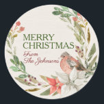 Sticker Rond Nom personnalisé Joyeux Noël Aquarelle Bird Wreath<br><div class="desc">belle base de texture ivoire aquarelle avec une couronne d'aquarelle de verts, de brindilles, de baies profondes, de poinsettias rouges et blanches, avec un précieux ami volant peché sur les fleurs. Les deux zones de texte sont personnalisables. d'abord dit joyeux noël, envoyer inclut une police de script pour votre emplacement...</div>