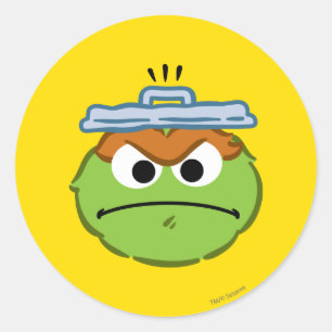 Sticker Rond Oscar visage en colère