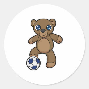 Sticker Rond Ours comme joueur de football avec balle de footba