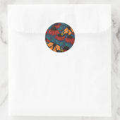 Sticker Rond Papillon monarque sur des fleurs rouges (Sac)