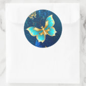 Sticker Rond Papillons d'or sur un Arrière - plan bleu (Sac)