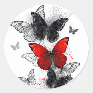 Sticker Rond Papillons noirs et rouges volants