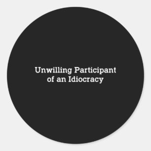 Sticker Rond Participant malgré lui d'une idiocratie drôle poli