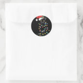 Sticker Rond Père Noël Chat Noir Tangé Dans La Lumière De L'Arb (Sac)