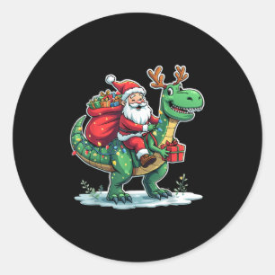 Sticker Rond Père Noël chevauchant dinosaure T Rex cerf lumière