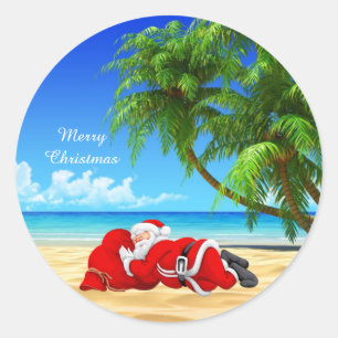 Sticker Rond père Noël dormant sur la plage
