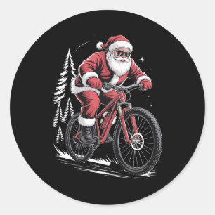Sticker Rond Père Noël en VTT sur les arbres de Noël