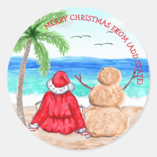 Sticker Rond Père Noël et Snowman amusants sur la plage Noël