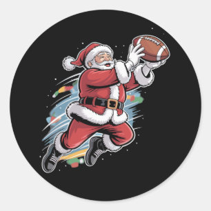 Sticker Rond Père Noël jouant au football américain de Noël