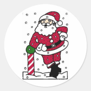 Sticker Rond Père Noël Se Détendre Sur Les Phoques De Noël Du P