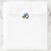 Sticker Rond Perroquet en tant que skate avec skateboard (Sac)