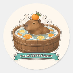 Sticker Rond Petit capybara calme dans une baignoire en bois