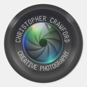 Sticker Rond Photographe et objectif de caméra d'affaires de