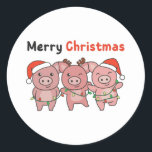 Sticker Rond Pig Christmas Cute Pigs Merry Christmas<br><div class="desc">Merry Christmas. Les pigs are decorated with fairy lights for christmas. Veuh fairy lights and Santa's hats they are perfect pour Christmas. Every pig lover is happy about the cute animals.</div>