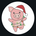 Sticker Rond Pig Christmas Winter Animals<br><div class="desc">The pig at Christmas with fairy lights. Funny animals with toxits and snow for the holidays. A sweet Christmas greeting. Pigs are cute animals et perfect pour Christmas.</div>