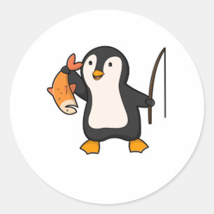 Sticker Rond Pingouin comme pêcheur avec poisson