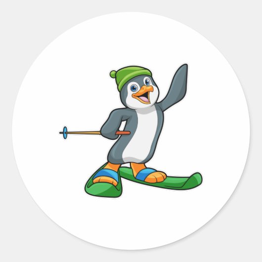 Sticker Rond Pingouin comme skieur avec ski et Casquette (Devant)