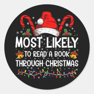 Sticker Rond Plus susceptible de lire un livre à travers Noël