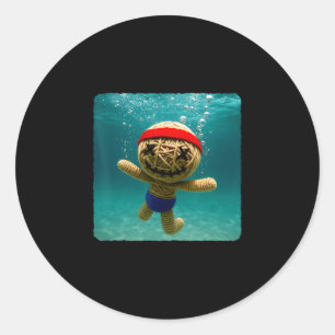 Sticker Rond Poupée vaudou plongeant sous l'eau plongeur océani