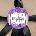 Sticker Rond Purple florals white glitter stripes monogram name<br><div class="desc">Classic slim purple faux glitter and white vertical stripes as background.  With girly purple flowers as decoration.  
A frame on front with template for a name.  The name is written with a hand-lettered style script. Template for Your monogram letter.</div>