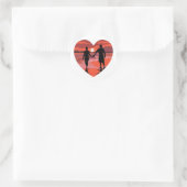Sticker Rond Red Heart Sunset Beach tenant la main (Sac)