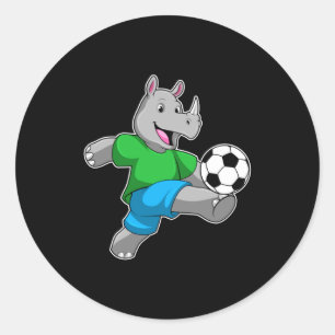 Sticker Rond Rhinocéros en tant que joueur de football avec un