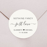 Sticker Rond Rien de fantaisie Just Love Mariage<br><div class="desc">Un sticker chic crème légère pour vos invitations de mariage,  faveurs et cartes de remerciements avec "Nothing Fancy Just Love" présenté dans un mélange de lettrage simple et un script élégant avec des swashes,  vos prénoms unis par un coeur et votre date de mariage ou de réception.</div>