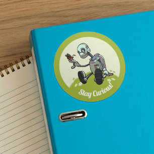 Sticker Rond Robot Curieux voit son premier dessin animé de pap