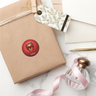 Sticker Rond Romance vintage avec un coeur et des ailes.