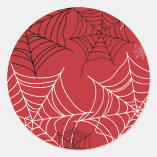Sticker Rond Rouge avec des toiles d'araignée noires et