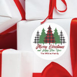 Sticker Rond Rouge rustique Joyeux Noël Joyeux Nouvel An<br><div class="desc">Cet autocollant de vacances rustique présente des plaids rouges et des arbres de Noël verts au-dessus de votre message Joyeux Noël et Bonne Année. Un look mignon et traditionnel qui est actuellement de nouveau dans le style, ces autocollants de cadeau festifs sont parfaits pour une famille qui aime un design...</div>