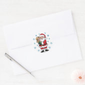 Sticker Rond Santa Clause accrocher une fille avec des flocons (Enveloppe)