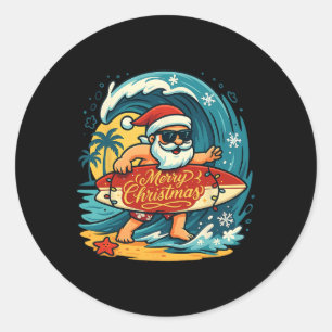 Sticker Rond Santa surfant sur la plage hawaïenne Noël en juill