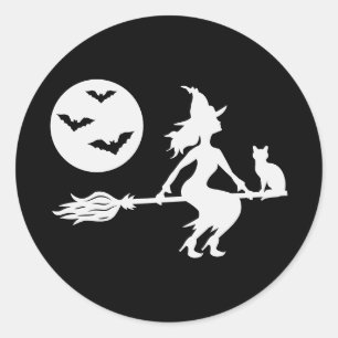 Sticker Rond Silhouette Blanche D'une Sorcière Sur Un Balai Hal