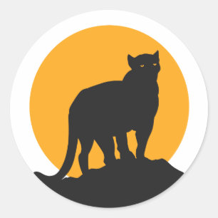 Sticker Rond Silhouette du coucher de soleil de panthère noire