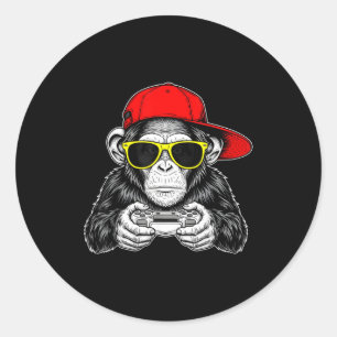 Sticker Rond Singe de gamer cool avec manette vidéo de jeu drôl