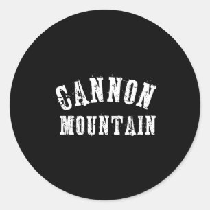 Sticker Rond skieur audacieux et artisan de la montagne Cannon