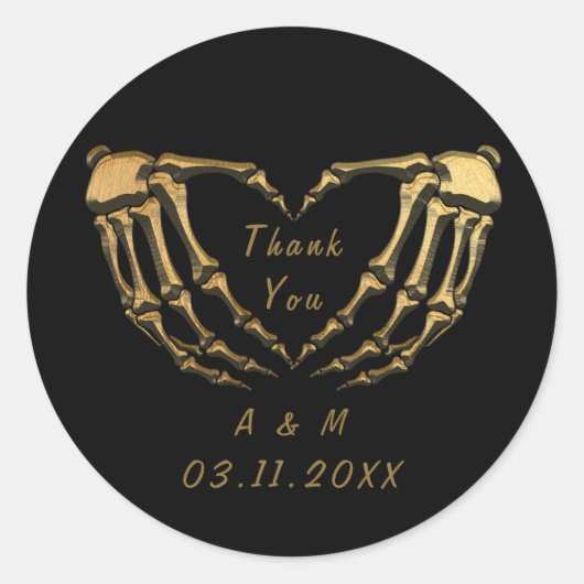 Sticker Rond Squelette de mains gothiques or noir forme de coeu (Devant)