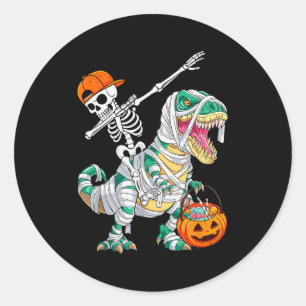 Sticker Rond Squelette faisant du dab de danse en monté sur un