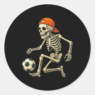 Sticker Rond Squelette jouant au football graphique d'Halloween