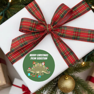 Sticker Rond Stégosaure drôle avec des lumières de Noël et des