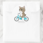 Sticker Rond Tabby cat fait du vélo. (Sac)
