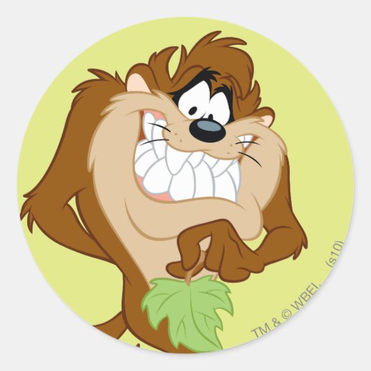 Sticker Rond TAZ™ tenant une feuille (Devant)