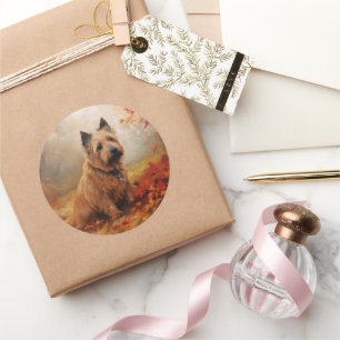 Sticker Rond Terrier Australien dans les feuilles d'automne qui