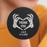 Sticker Rond Til Death Black Skeleton Heart Wedding Thank You<br><div class="desc">Black wedding thank you stickers from the collection "'Til death do us part". It features spooky skeleton hands forming a heart on the front. Party supplies with an editable date and the bride and groom's initials or names. Be sure to visit our collection to see more coordinating items that match...</div>