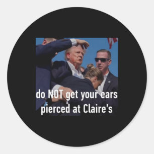 Sticker Rond Tirer ne vous fait pas percer les oreilles à Clair