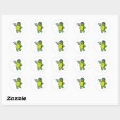 Sticker Rond Tortue comme pilote avec avion en papier (Feuille)